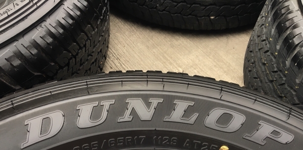 ยางป้ายแดง 265-65-17 Dunlop ปี 18 ตุ่มอลัง เส้นสีชัด ยางป้ายแดง 265-65-17 Dunlop ปี 18 ตุ่มอลัง เส้นสีชัด