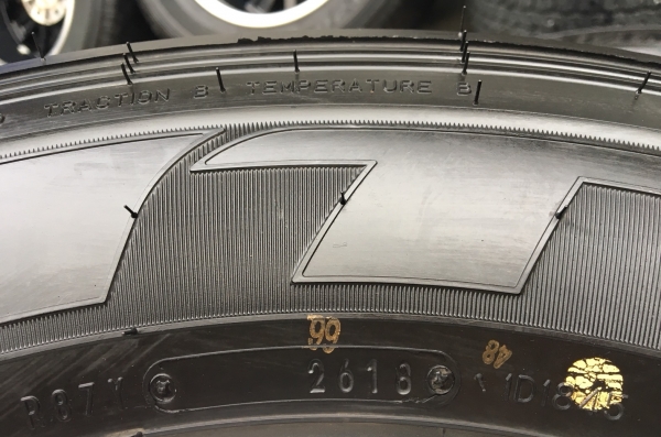 ยางป้ายแดง 265-65-17 Dunlop ปี 18 ตุ่มอลัง เส้นสีชัด ยางป้ายแดง 265-65-17 Dunlop ปี 18 ตุ่มอลัง เส้นสีชัด