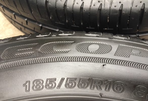 ยางป้ายแดง Bridgestone 185-55-16 ปี 18 ดอกเต็ม มีตุ่ม ยางป้ายแดง Bridgestone 185-55-16 ปี 18 ดอกเต็ม มีตุ่ม