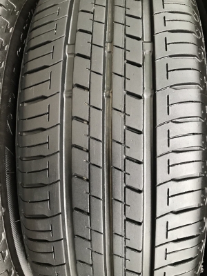 ยางป้ายแดง Bridgestone 185-55-16 ปี 18 ดอกเต็ม มีตุ่ม