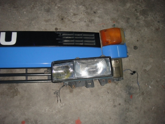 หน้ากาก + ตาไฟ + ไฟมุม + แก้ม  ของ ISUZU 115 แรงตาหวาน