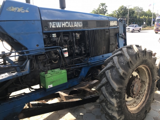 ขายรถไถ6640คานหน้านิวฮอนแลนรถพร้อมใช้มีดันหน้าหางเจ็ดเล่มทะเบียน