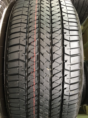 ยางป้ายแดง 265-60-18 Bridgestone ปี 18 ดอกเต็ม ตุ่มเด้งๆ เส้นสีชัด
