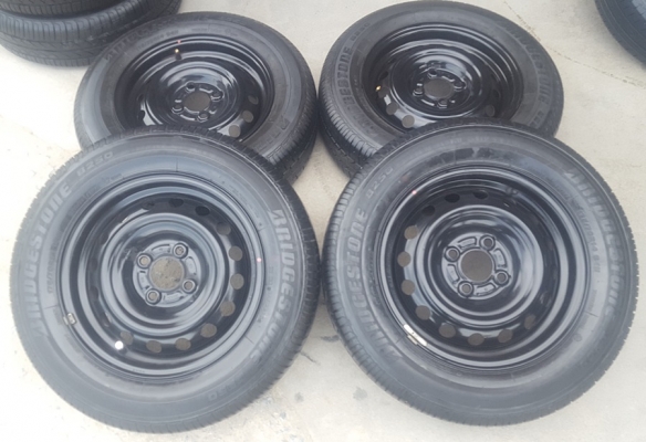 ขายล้อกะทะ NISSAN ขอบ14 พร้อมยางฝาครอบ 4 ล้อ