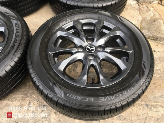ล้อแม็กป้ายแดง Mazda 2 ขอบ 15 สีดำ พร้อมยางป้ายแดง Dunlop 185-65-15 ปี 18 แม็กสวย ดอกหนานิ่มเต็มๆ