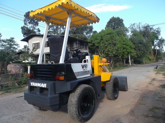 ขายรถตักล้อยางYANMAR V 3  เก่าในสภาพดีพร้อมใช้เกียร์ทอ็กสั่งงานไฟฟ้า เครื่องดี สีทำใหม่