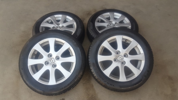 ล้อMazda2 ขอบ15 ยาง185/60/15 ปี 15  4 ล้อ