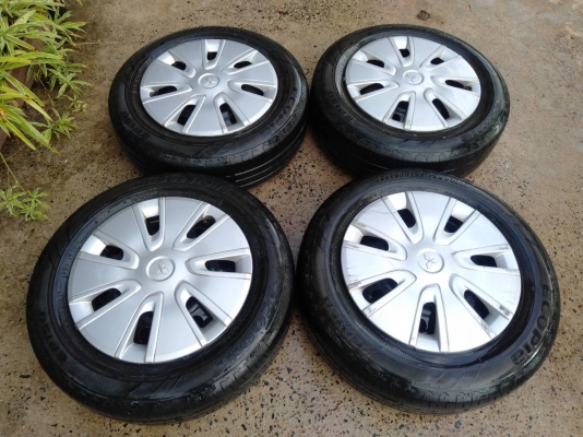 ล้อกระทะเก๋งมิตซูบิชิ ขอบ14 4รู100 พร้อมยางบริดสโตน ปี13 ชุด4ล้อ