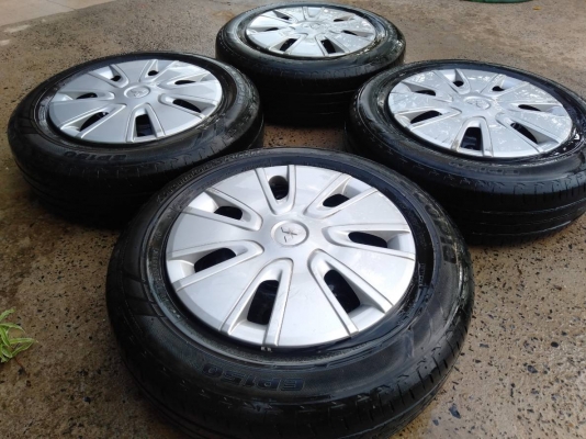 ล้อกระทะเก๋งมิตซูบิชิ ขอบ14 4รู100 พร้อมยางบริดสโตน ปี13 ชุด4ล้อ