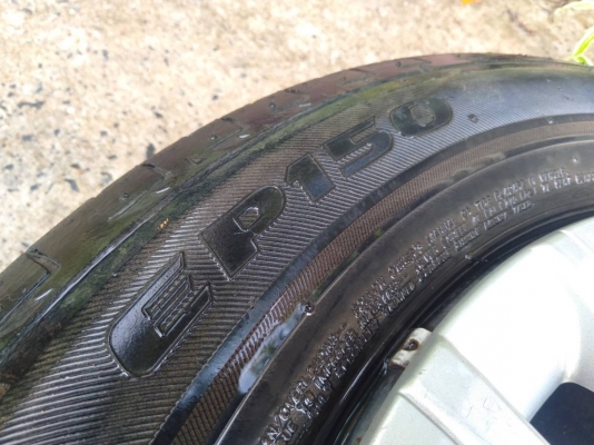 ล้อกระทะเก๋งมิตซูบิชิ ขอบ14 4รู100 พร้อมยางบริดสโตน ปี13 ชุด4ล้อ