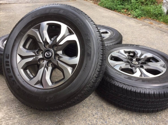 ขายล้อ MAZDA BT50Pro ขอบ17 พร้อมยาง BRIDGESTONE 265-65-17 ปี13 ชุดละ 8,500 บาท