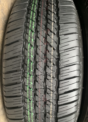 ยางใหม่ป้ายแดง 255-65-17 Bridgestone ปลายปี 18 ดอกเต็มๆ ตุ่มอลัง เส้นสีจัดจ้าน