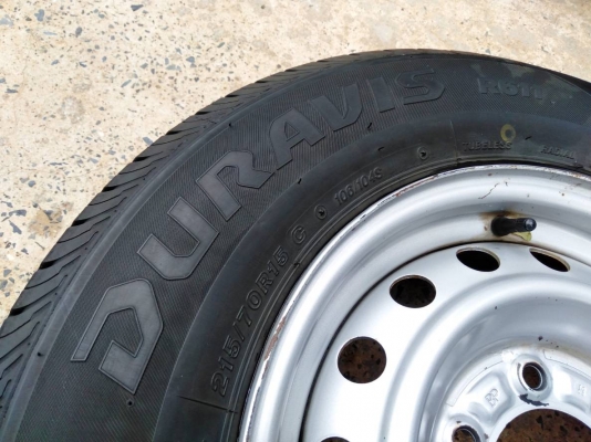 ล้อกระทะอีซูซุ 6รู ขอบ15 พร้อมยางบริดสโตน ดูร่าวิส215/70R15 ปี16 ชุด 4ล้อ