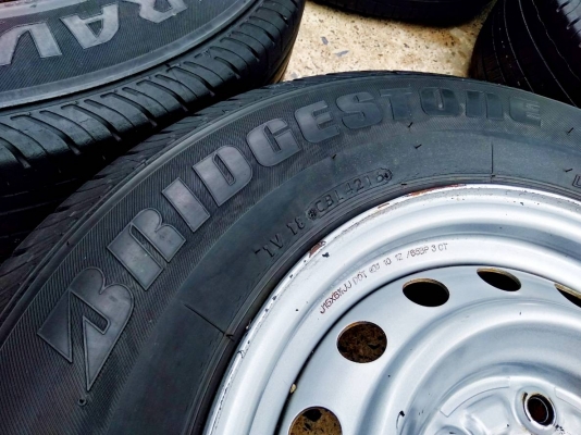 ล้อกระทะอีซูซุ 6รู ขอบ15 พร้อมยางบริดสโตน ดูร่าวิส215/70R15 ปี16 ชุด 4ล้อ