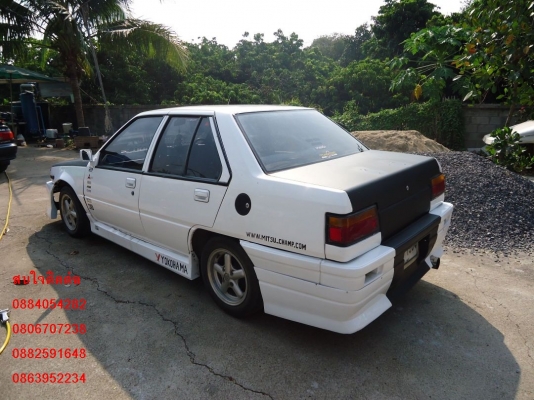 ขาย Mitsubishi champ สีขาว ชุดแต่งรอบคัน ราคา 39,000 บาท +++++++++