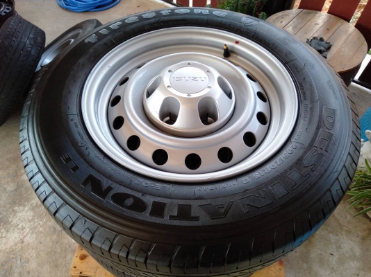 ล้อกระทะอีซูซุ ถอดป้ายแดง ขอบ15 6รู139.7 พร้อมยาง\% ไฟร์สโตน สวยๆ ชุด 4ล้อ ล้อกระทะอีซูซุ ถอดป้ายแดง ขอบ15 6รู139.7 พร้อมยาง\% ไฟร์สโตน สวยๆ ชุด 4ล้อ