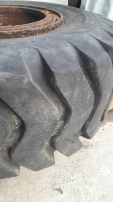 ยางรถตักล้อยาง 23.5/25 พร้อมกะทะ16รูน็อตใส่รถ CAT