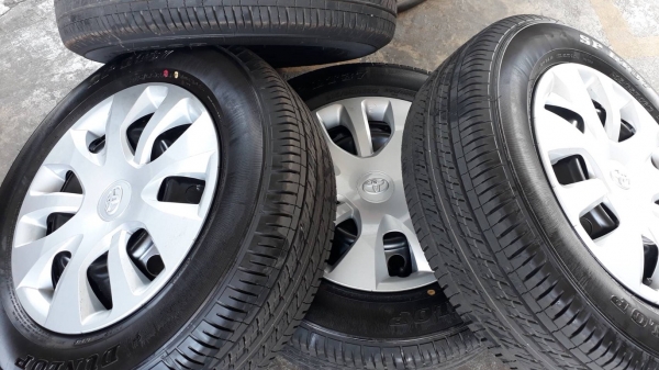 ล้อกะทะป้ายแดง Revo 16 พร้อมยาง Dunlop 215/65/16 ปลายปี 18