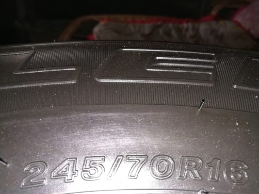 ยางเปล่าบริสโตน245/70/16ปี19ถอดศูนย์ป้ายแดง