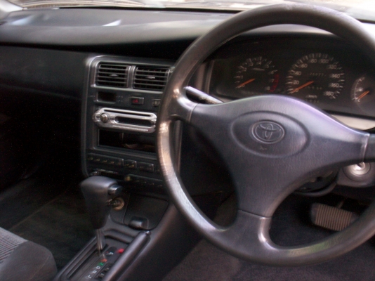 ขายรถโตโยต้าโคโรน่า ปี99ท้ายโด่งST190สีเทา เกียร์ออโต้ แก๊สLPG ราคา179,000บาท