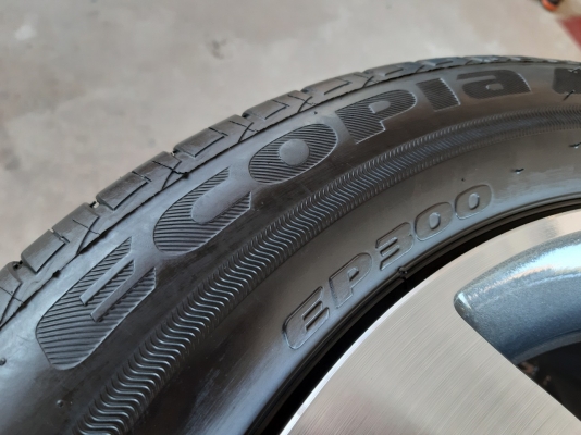 ล้อแม็กฮอนด้า ขอบ15 4รู100 พร้อมยางบริดสโตน EP300 ปี18