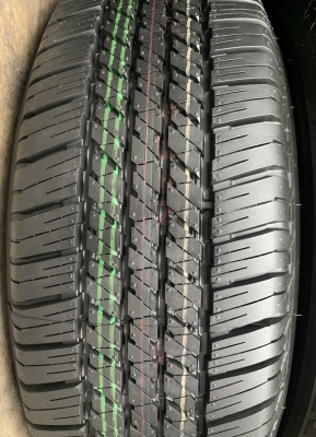 ยางใหม่ป้ายแดง 255-65-17 Bridgestone ตุ่มอลัง เส้นสีจัดจ้าน