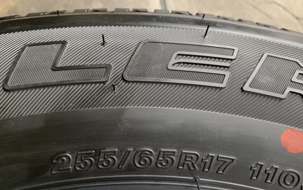 ยางใหม่ป้ายแดง 255-65-17 Bridgestone ตุ่มอลัง เส้นสีจัดจ้าน