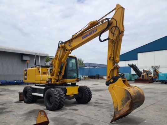 รถขุดล้อยาง PW130ES-6K มีลายหัวเจาะ มือสองยุโรป