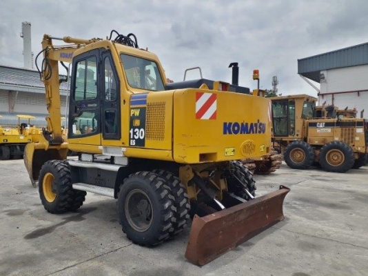 รถขุดล้อยาง PW130ES-6K มีลายหัวเจาะ มือสองยุโรป