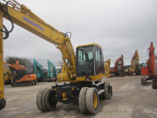 รถขุดล้อยาง PW130ES-6K มีลายหัวเจาะ มือสองยุโรป