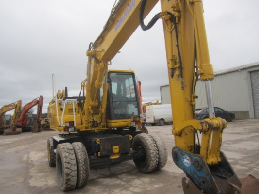 รถขุดล้อยาง PW130ES-6K มีลายหัวเจาะ มือสองยุโรป