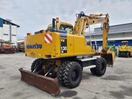 รถขุดล้อยาง PW130ES-6K มีลายหัวเจาะ มือสองยุโรป