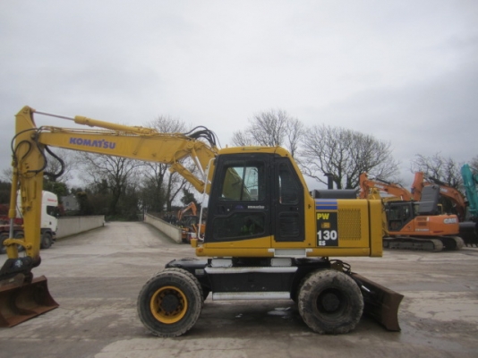 รถขุดล้อยาง PW130ES-6K มีลายหัวเจาะ มือสองยุโรป