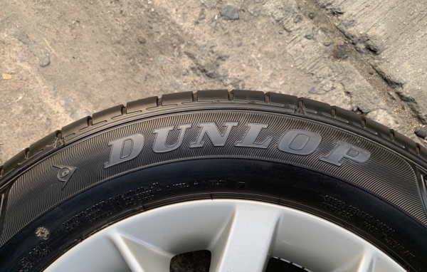 ล้อแม็ก 4รู100 Nissan Note ขอบ 15 พร้อมยาง 185-65-15 Dunlop ปี 18