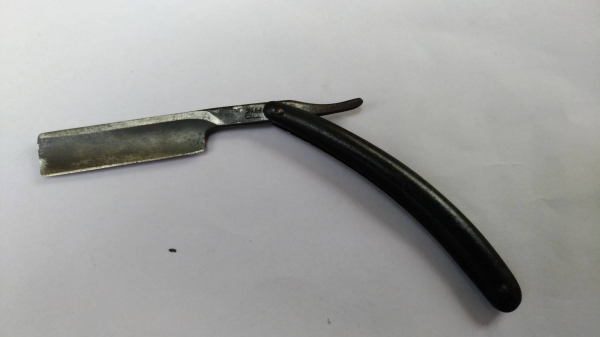 มีดโกนโบราณ(สะบัดหนัง)