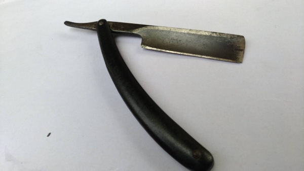 มีดโกนโบราณ(สะบัดหนัง)