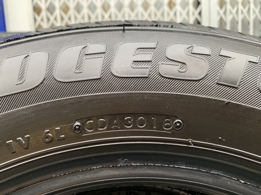 ยางป้ายแดง 205-70-15 Bridgestone ดอกเต็ม ตุ่มเด้งๆ