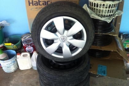 ขายล้อกระทะพร้อมฝาครอบนิววีออสขอบ15