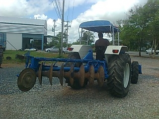 ขายรถไถ FORD 6610 2 เพลาดุมเรียบ เอกสารเล่มทะเบียน 7 จาน ใบมีดดันหน้า ราคา 630000