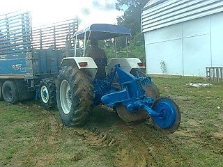 ขายรถไถ FORD 6610 2 เพลาดุมเรียบ เอกสารเล่มทะเบียน 7 จาน ใบมีดดันหน้า ราคา 630000
