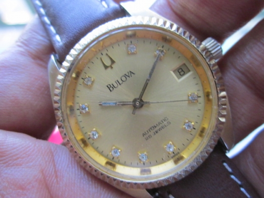 +++++ BULOVA เรือนทองขอบหยักหลังเปลือย +++++