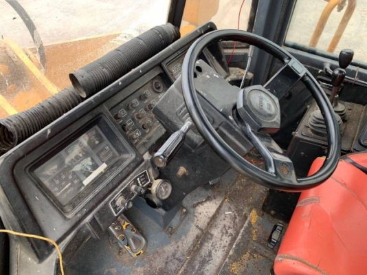 รถตัดล้อยาง ต่อแขนเปิดปากแล้ว รถโรงสี สภาพเก่านอก T.C.M.860-2เครื่องดีพร้อมใช้งาน ยางสวย