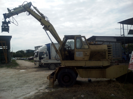 ขายแบคโฮล้อยางติดคีบหมุนรอบ