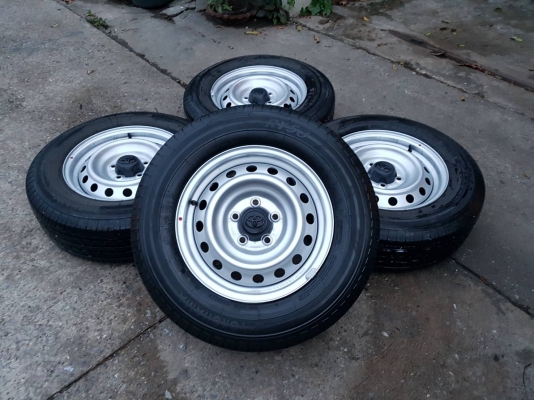 ล้อกะทะรีโว้ขอบ 15 พร้อมยางปี 18