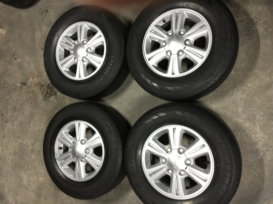 ล้ออีซูซุ ขอบ15+ยางบริสโตน215/70/15ปี17 ล้อสวยยางสวย ชุด6500บาท สนใจโทร0879050181.ส่งได้ทั่วไทย