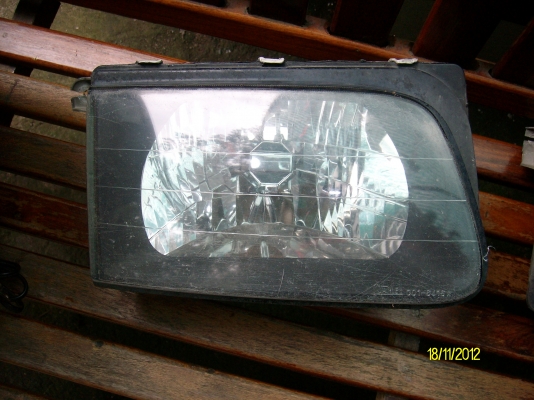 ขายโคมไฟฟ้าหน้า ISUZU  Drgon ของแท้ 1 คู่