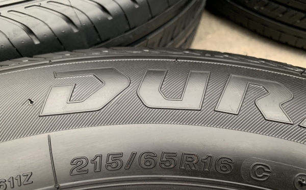 ยางใหม่ป้ายแดง 215-65-16 Bridgestone ปี 19 ตุ่มเป้งๆ เส้นสีชัดๆ