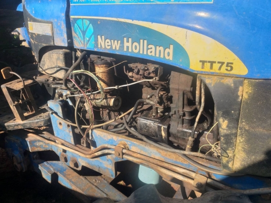 ขายด่วน รถไถ NEW HOLLAN T77 สองเพลา ขายตามสภาพ ชุดเพลาหน้าถอดเฟืองออกทั้งสองข้าง เครื่องเกียร์ดี ระบบไฮดรอลิดพร้อมใช้งาน สนใจสอบถาม 093 0764943  คุณ ตั้ม ราคา 280000