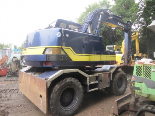 Kobelco SK100W-2 ปี2001 มีลายหัวเจาะ รถขุดล้อยางญี่ปุ่น โทร. 080-6565422 (หนิง)