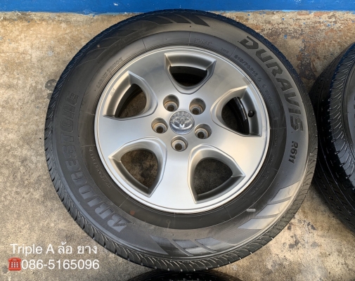 ล้อแม็ก Toyota Vigo Champ สีเทาดำ ขอบ 16 พร้อมยาง 215-70-16 Bridgestone ปลายปี 15 ล้อแม็ก Toyota Vigo Champ สีเทาดำ ขอบ 16 พร้อมยาง 215-70-16 Bridgestone ปลายปี 15